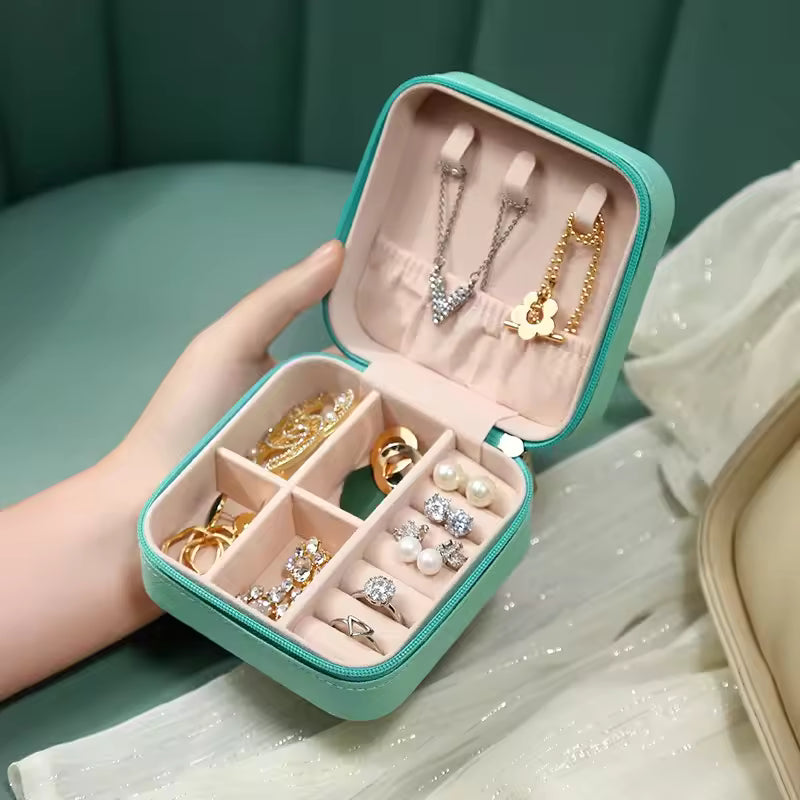 Mini caja de almacenamiento de joyería portátil
