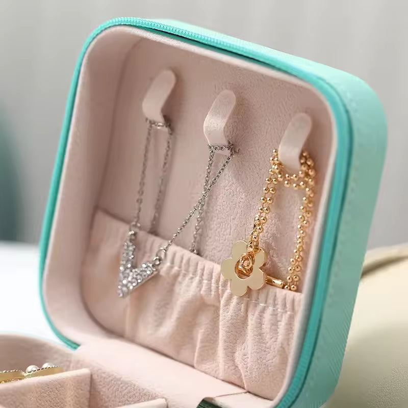 Mini caja de almacenamiento de joyería portátil